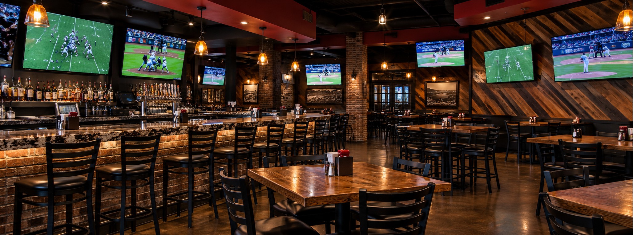 Oak tables, televisions and warm lighting in a neighborhood sports bar