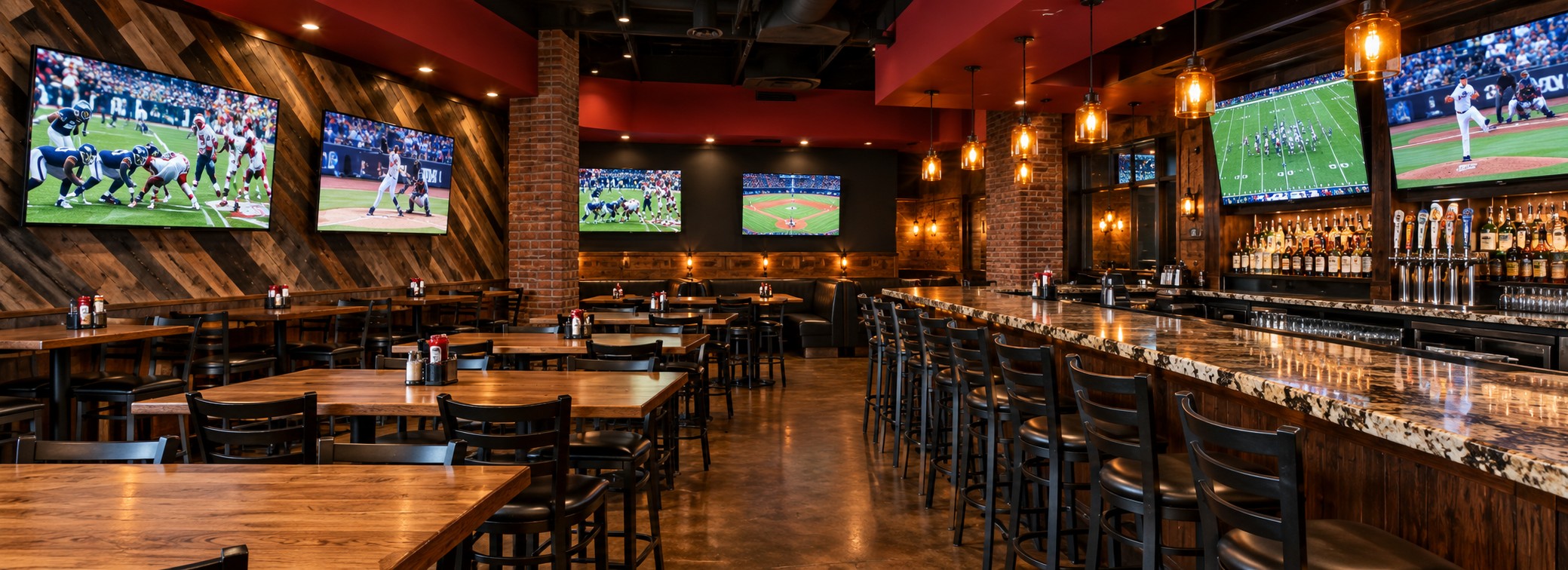 Food, cold drinks, and warm interior lighting at a neighborhood sports bar